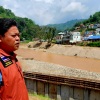 Bundit Pantarakon, a local businessman and city council member in Mae Sai, Thailand, looks over the Sai River.
