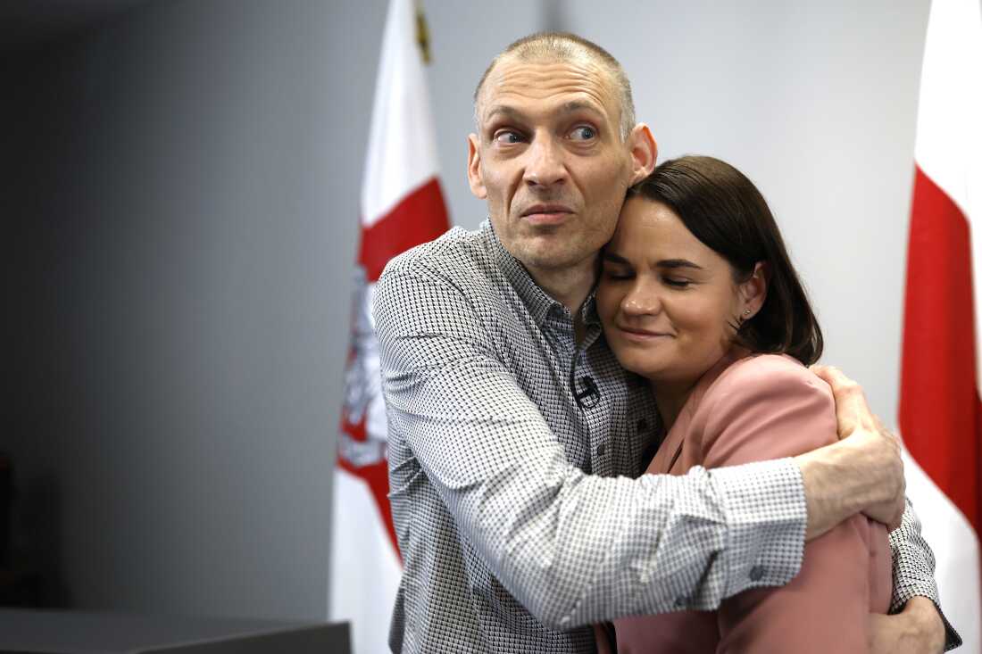 Syarhei Tsikhanouski, left, Belarusian opposition activist released from a Belarusian prison, embraces his wife, Belarusian opposition leader Sviatlana Tsikhanouskaya, after a news conference in Vilnius, Lithuania, Sunday, June 22, 2025.