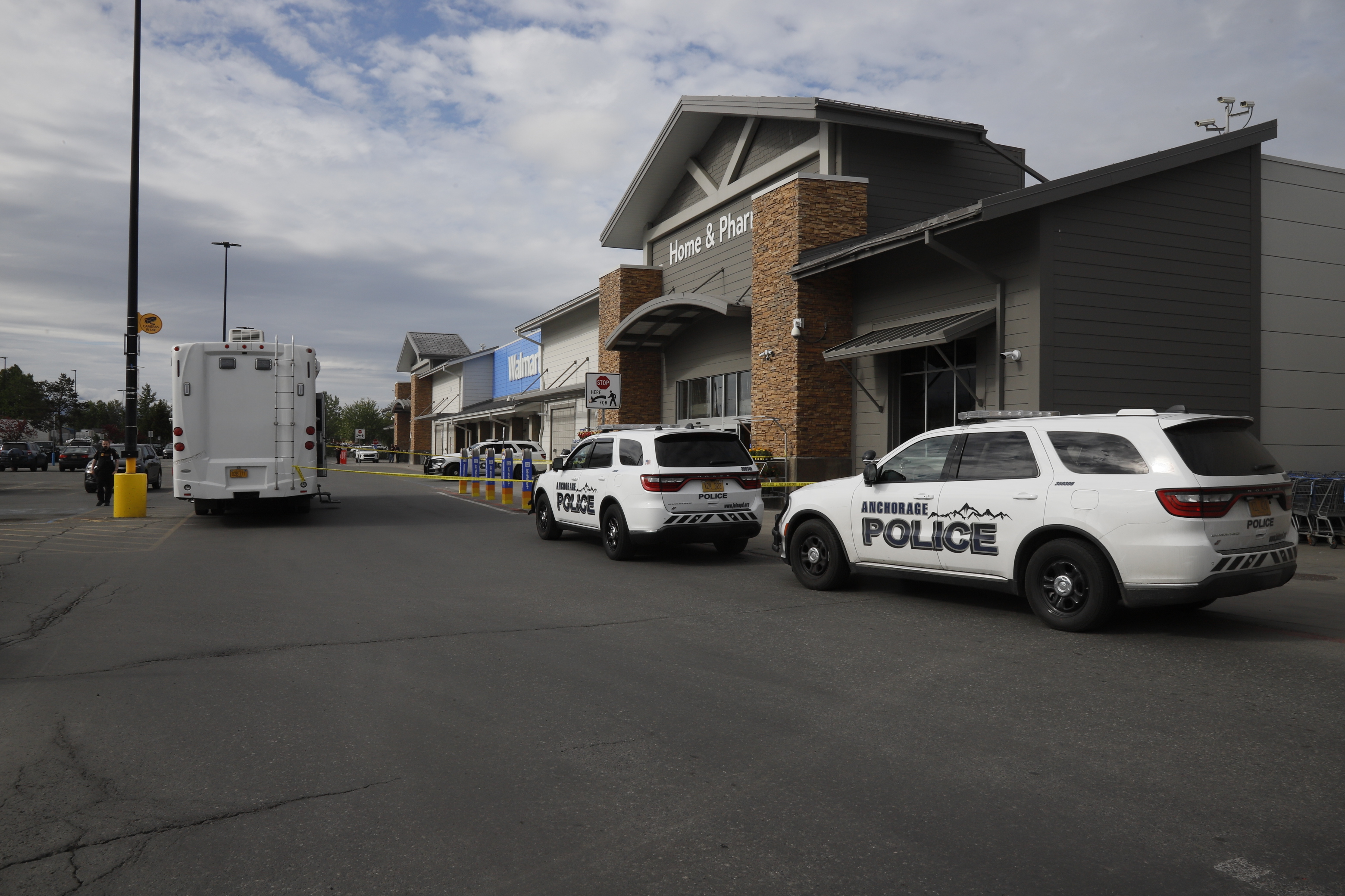 Shootout with police at South Anchorage Walmart leaves man dead and officer inju...