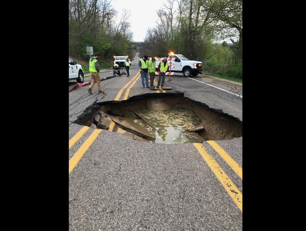 Gaping sinkhole closes road in Battle Creek