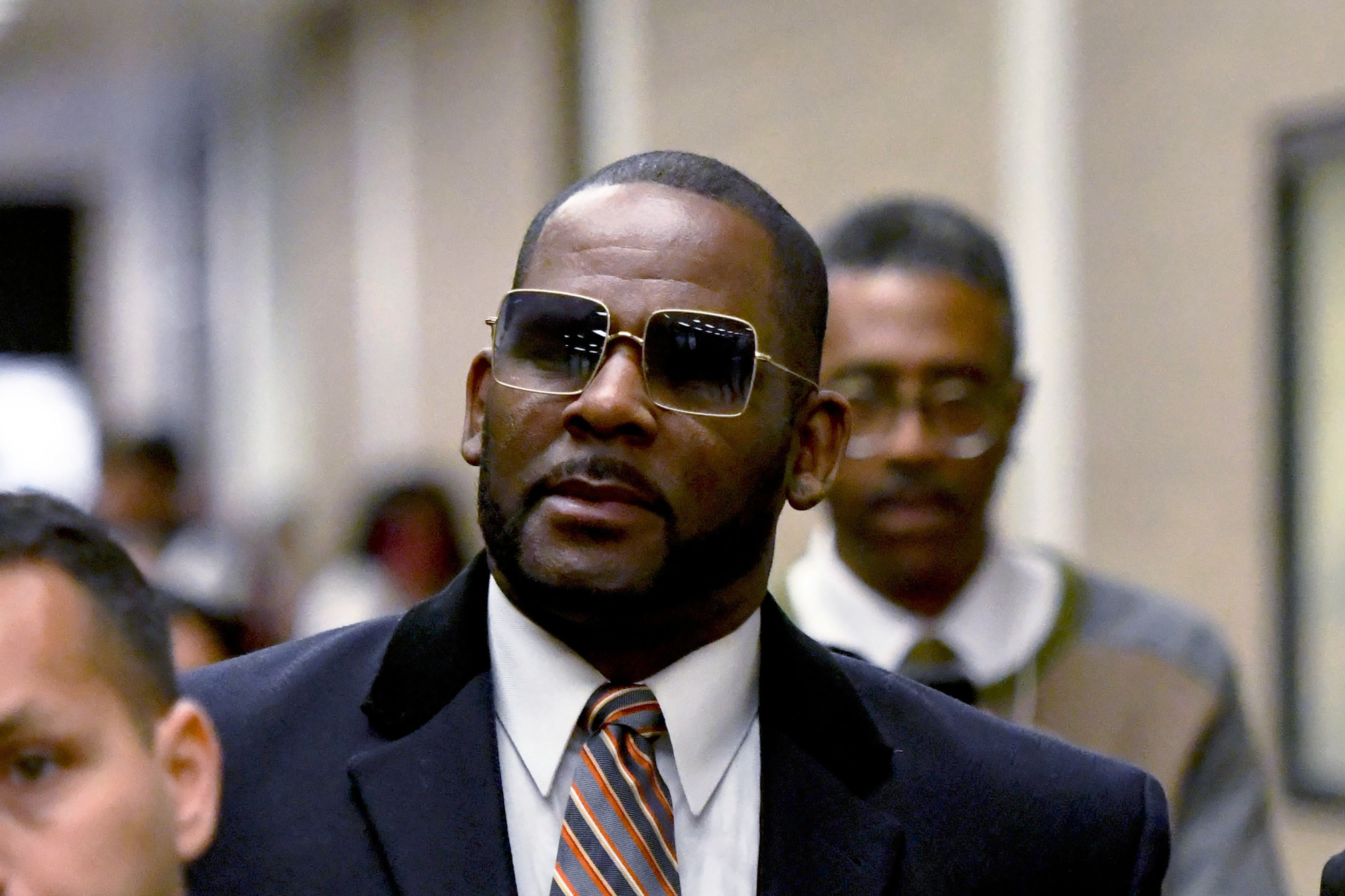 Singer R. Kelly alleges mistreatment after hospitalization and prison 'murder plot' | WUNC