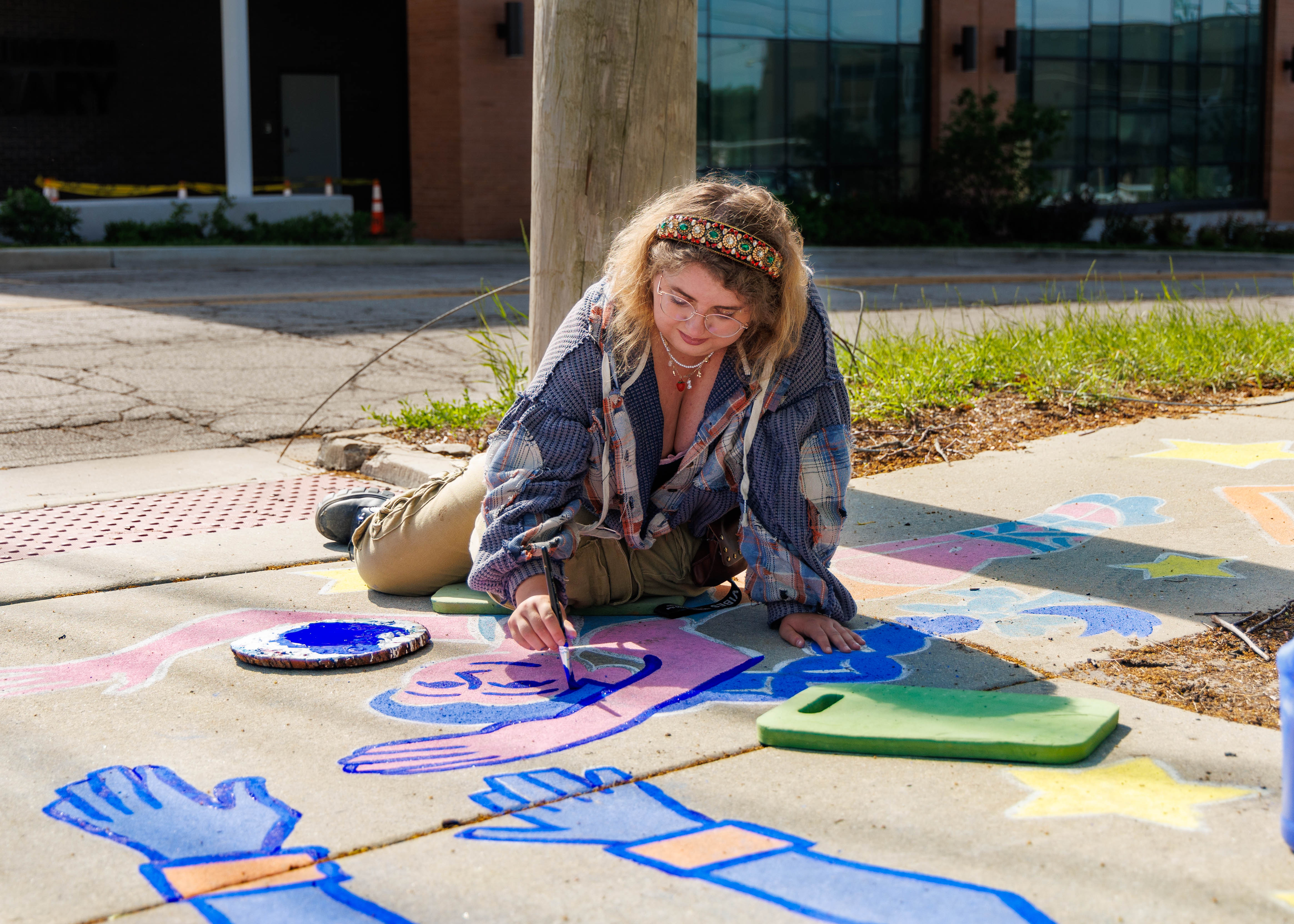 Video: Wayfinding circus-themed murals connect library to downtown Bloomington