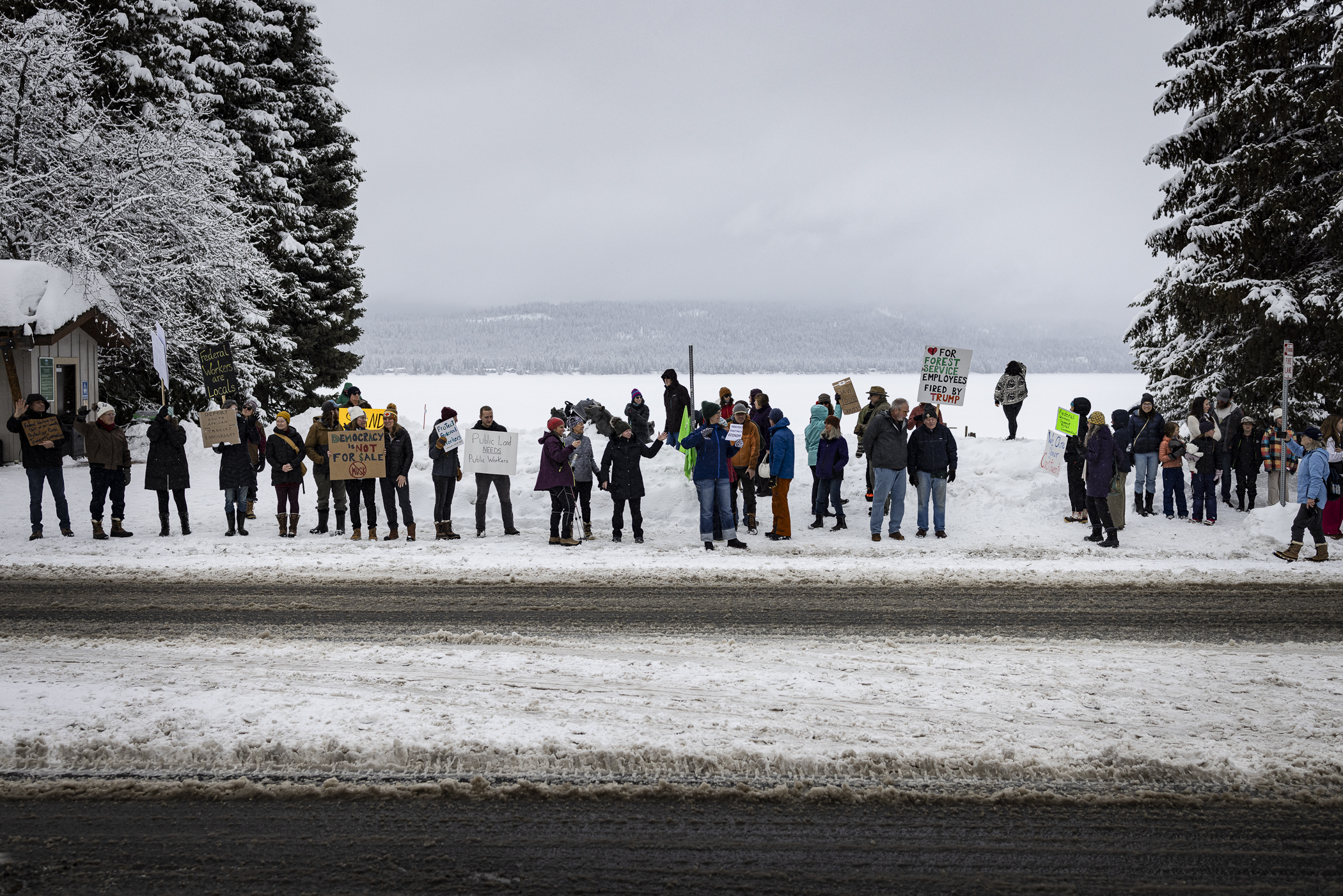 The crowd swelled to nearly 150 people in downtown McCall, Idaho, just off Payette Lake.