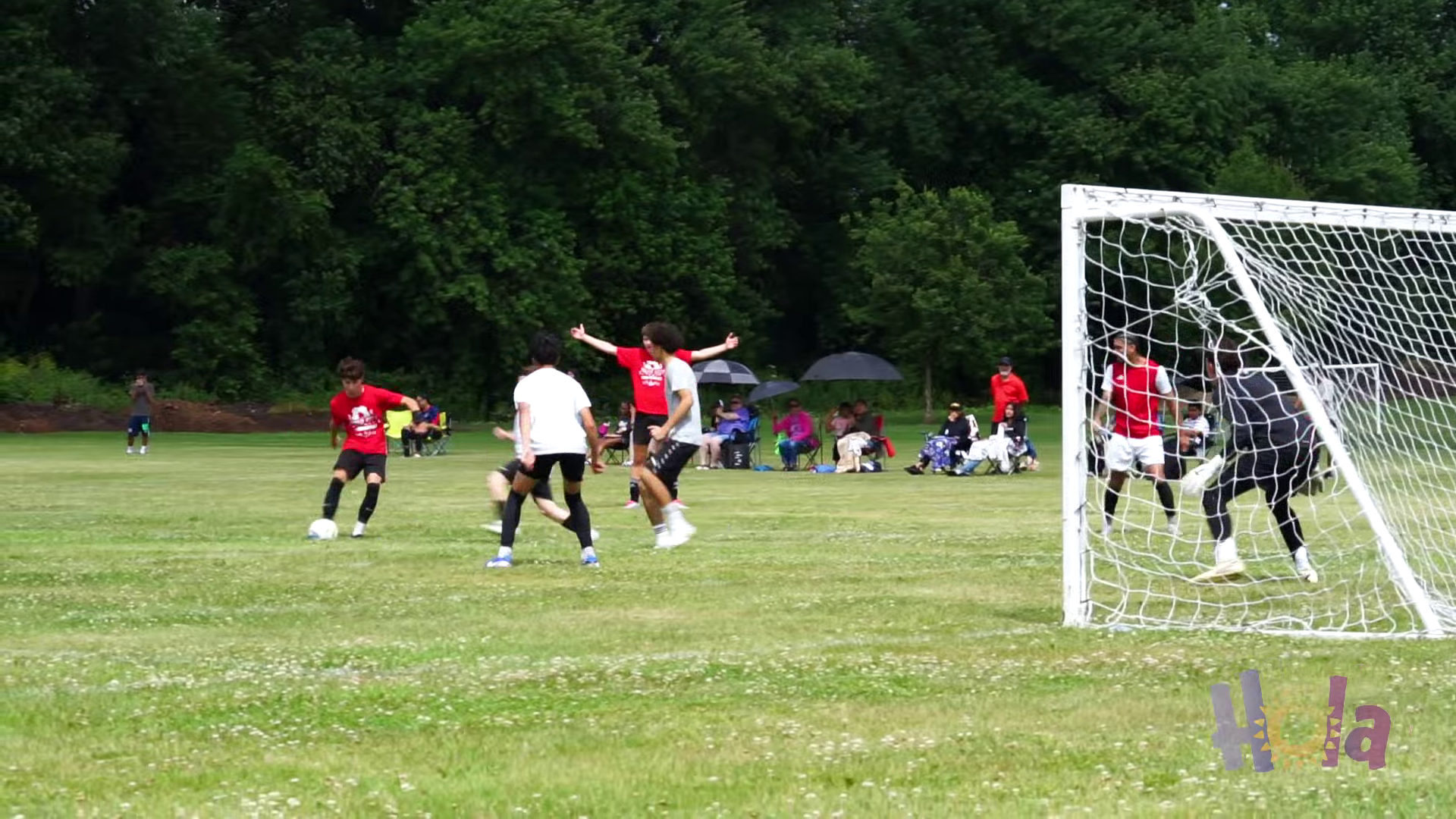 Hola Cup soccer action