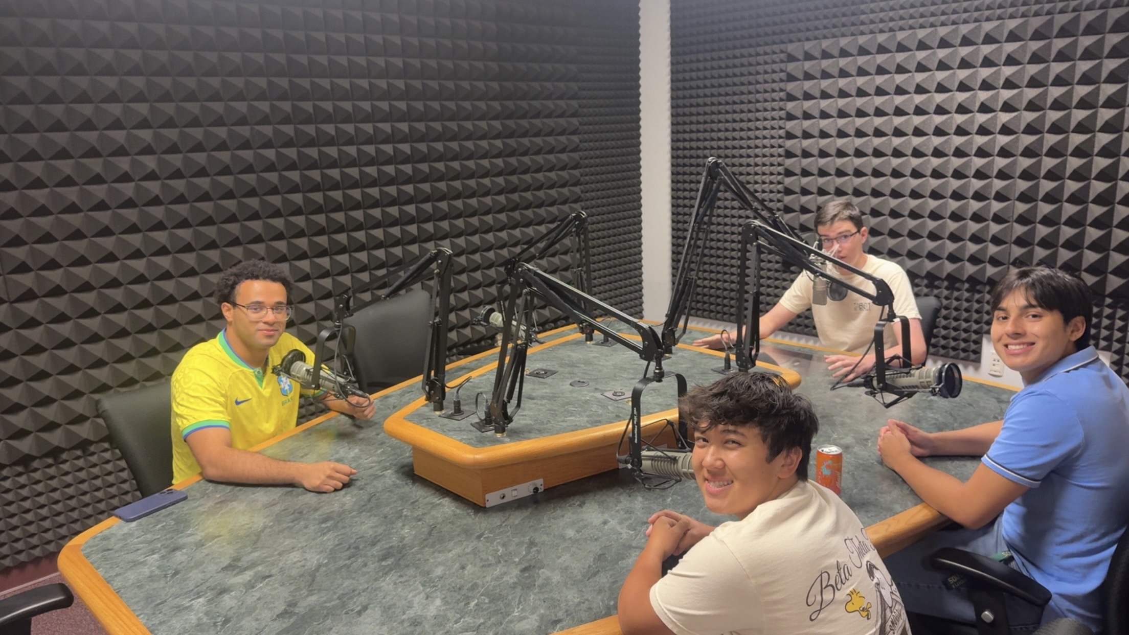 WUSF studio with guest at microphone