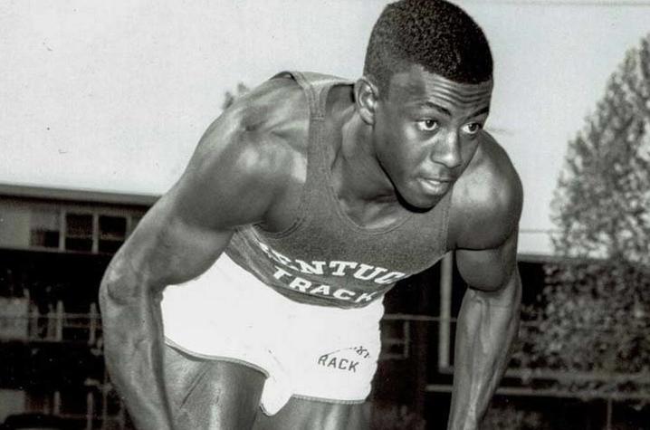 Jim Green leaning forward in his Kentucky Track uniform