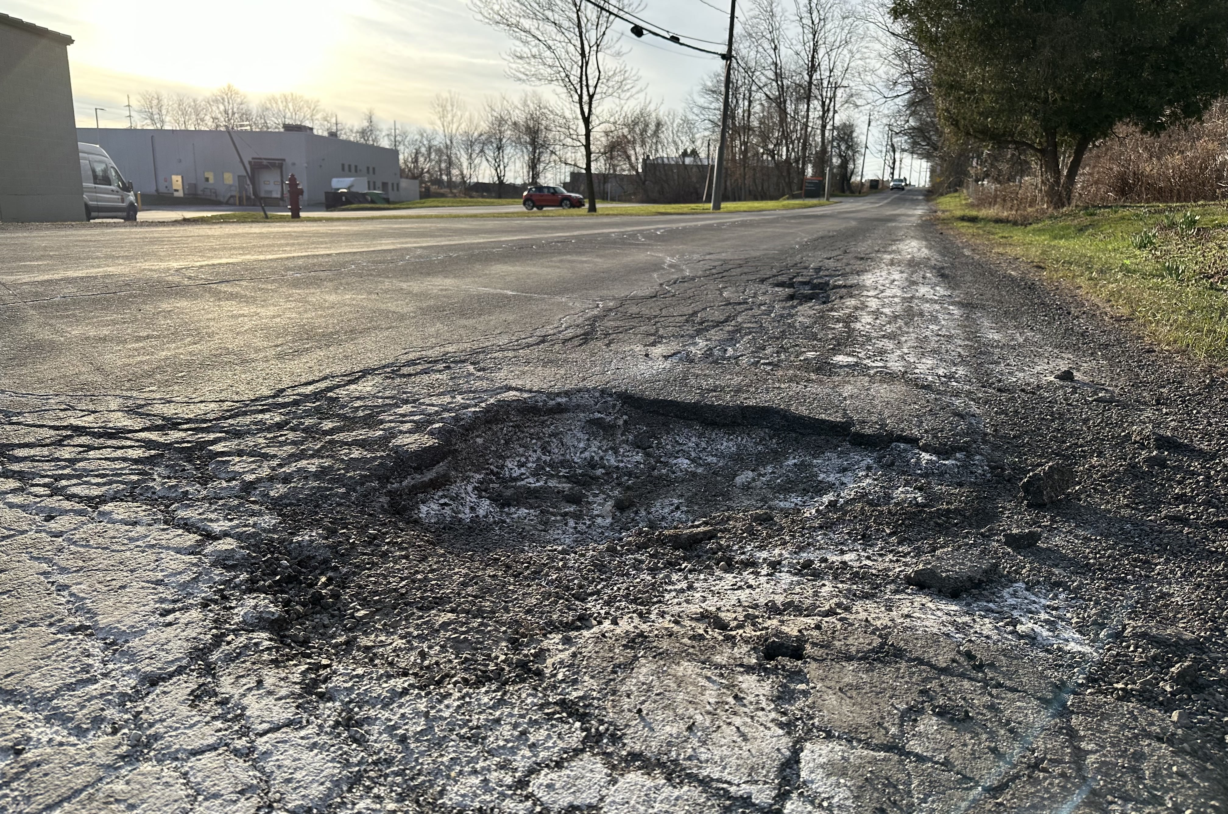                             Potholes emerge on Syracuse streets as spring temperatures rise. © Connor Bankoff