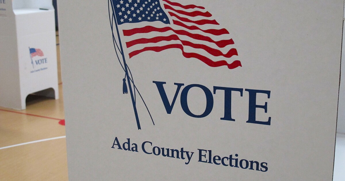 A voting box at Ada County Elections with an American flag and the word vote
