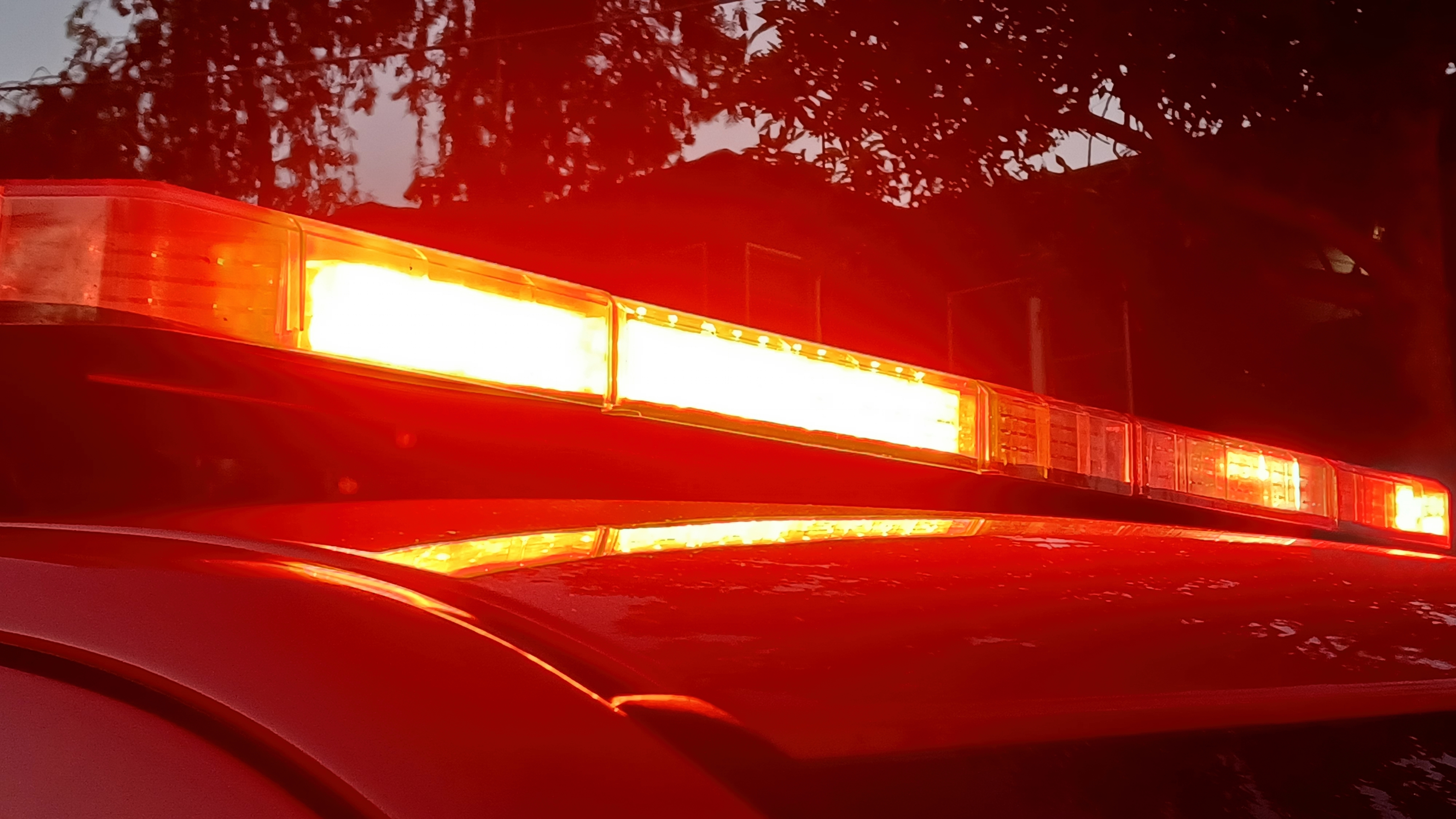 https://npr.brightspotcdn.com/7f/dd/596b502d4bbeb525752d424d2ca0/052826-fire-truck-light-closeup-shutterstock.jpg