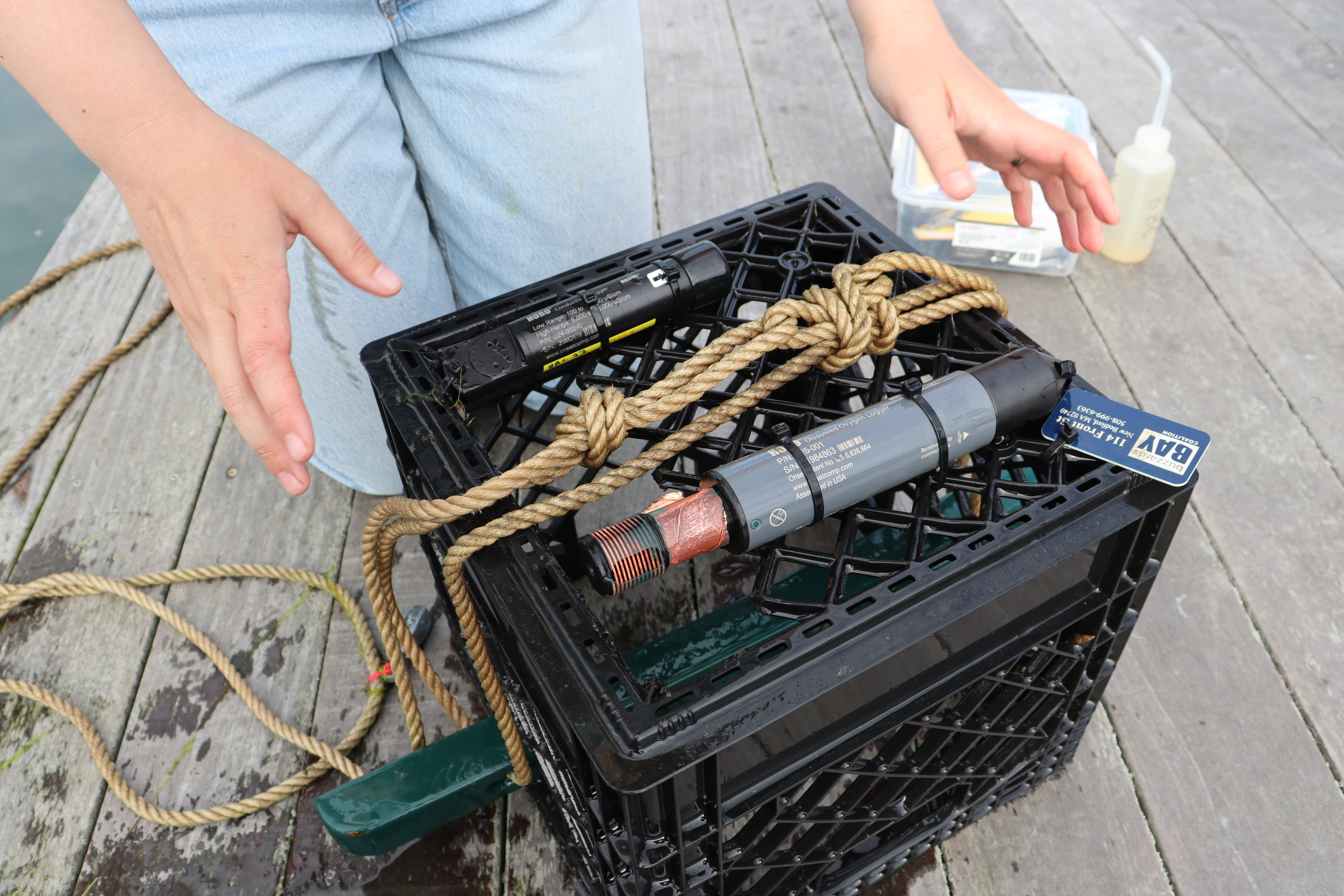 Kristin Huizenga demonstrates how she works with the data loggers.