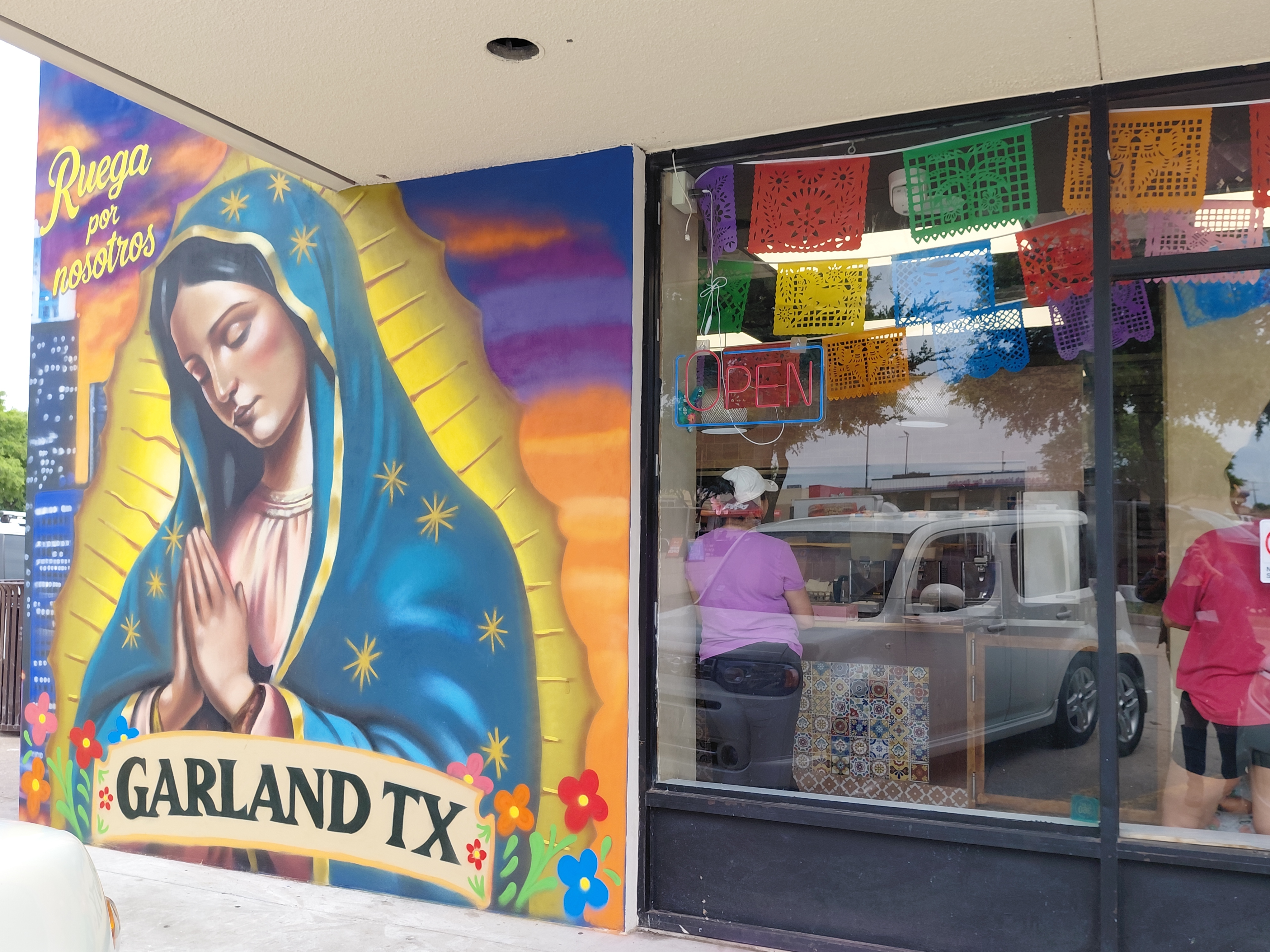 Virgin of Guadalupe mural to temporarily stay up at Garland business