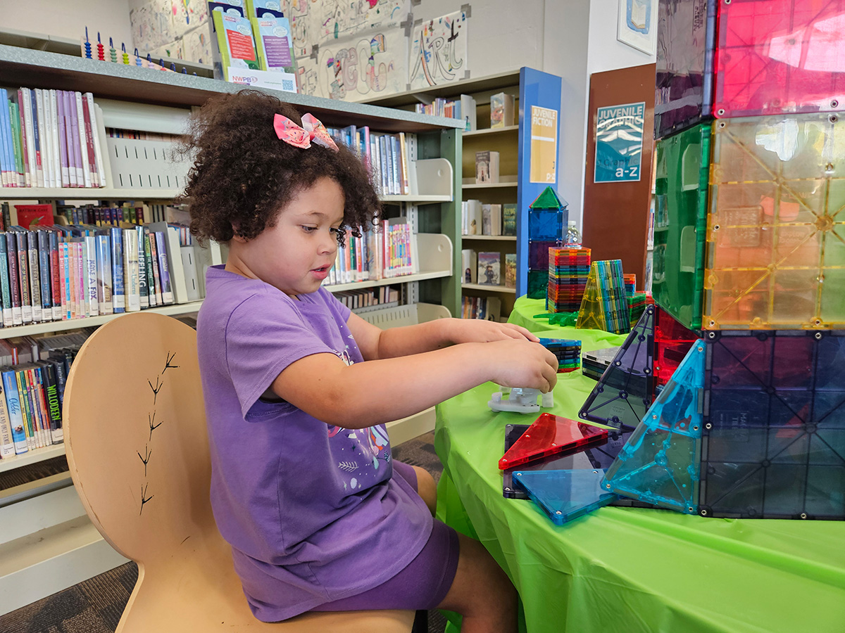 Child playing with an educational toy