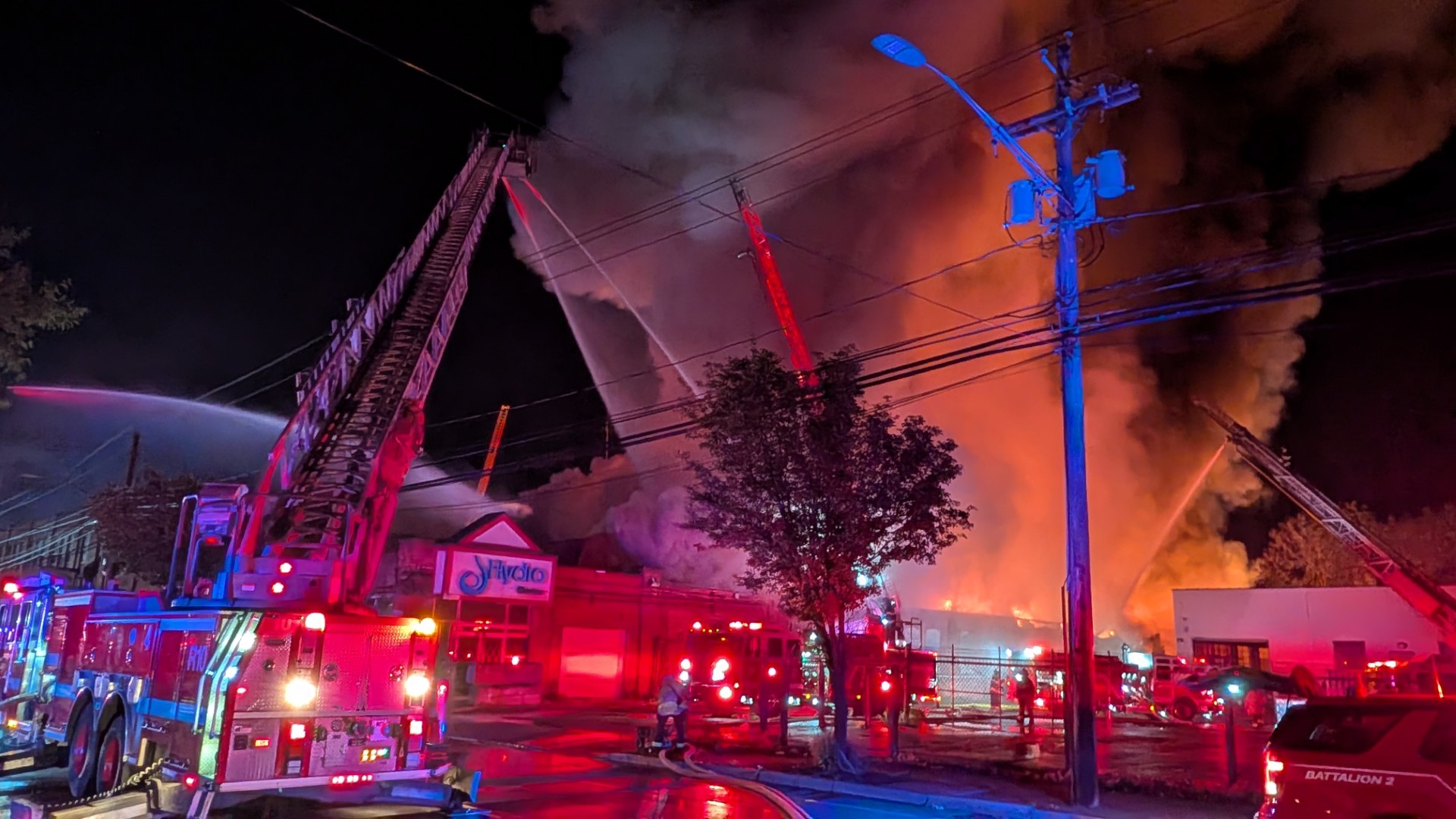 Five alarm fire ravages business on Lyell Ave