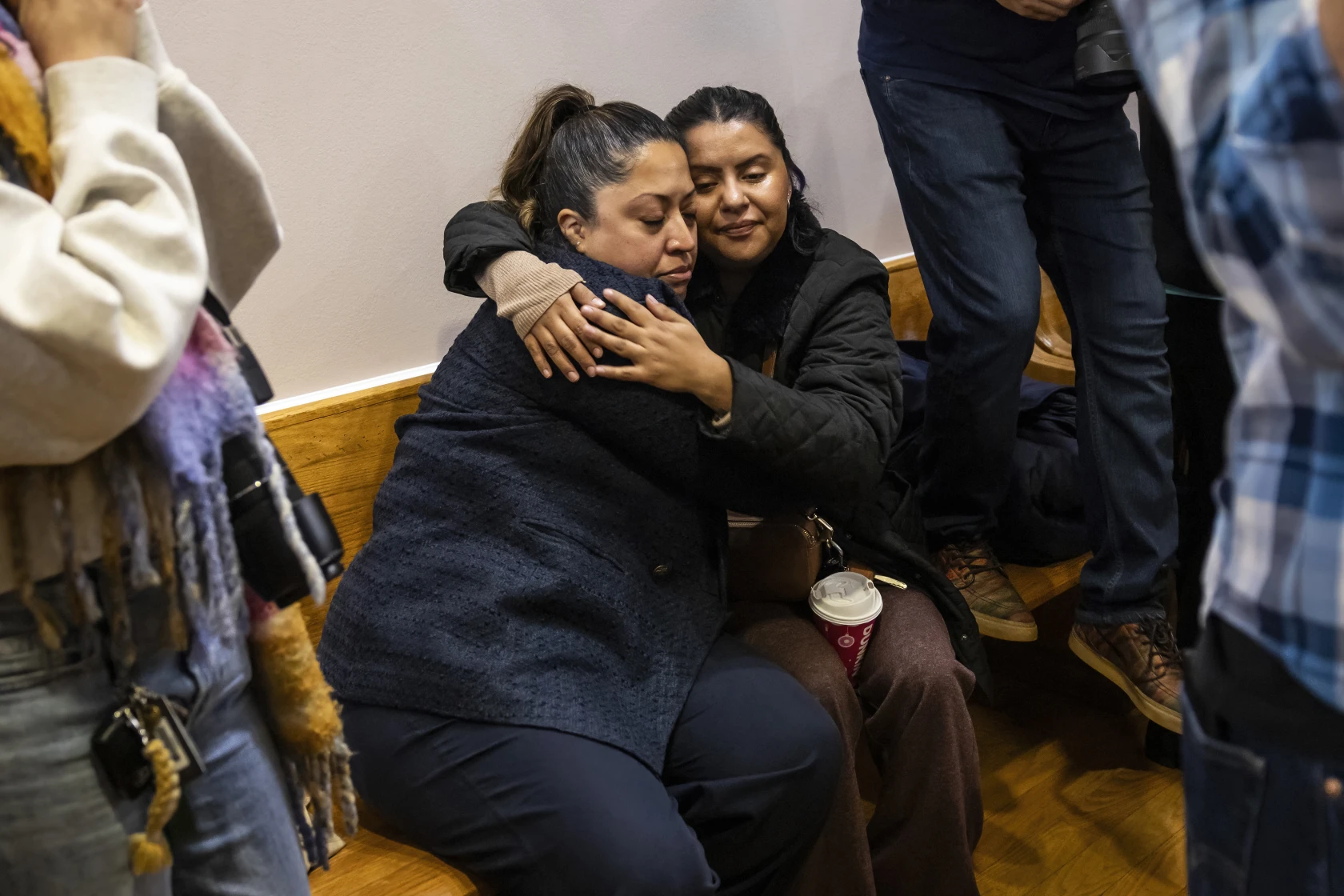 Immigrant advocates and Illinois legislators process Trump's ...