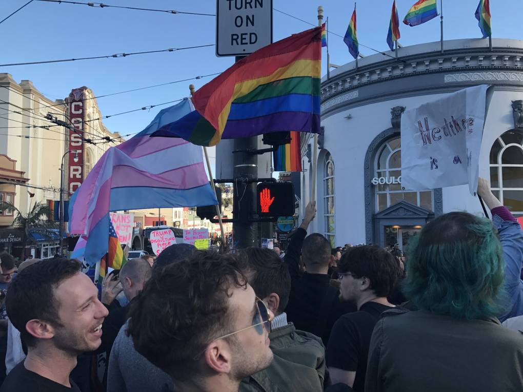People protest President Donald Trump’s decision to bar transgender people from serving in the military, in a march through San Francisco’s Castro neighborhood on July 26, 2017. (Polly Stryker/KQED)