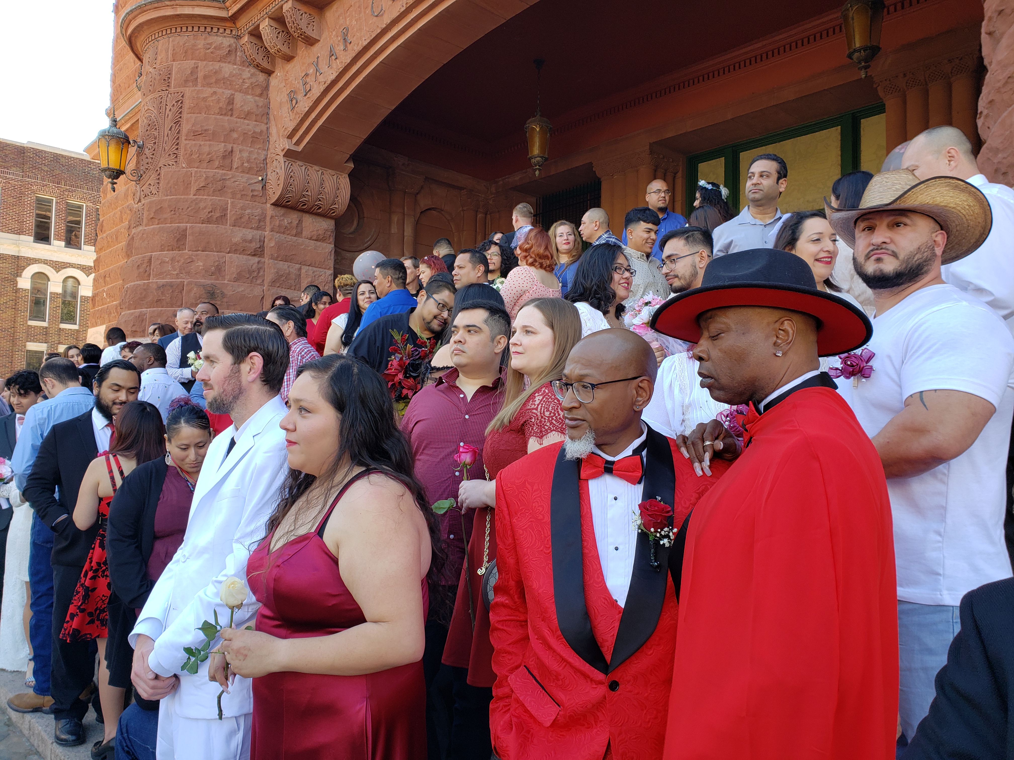 Love in the air as newlyweds celebrate on the steps of the Bexar County  Courthouse | TPR