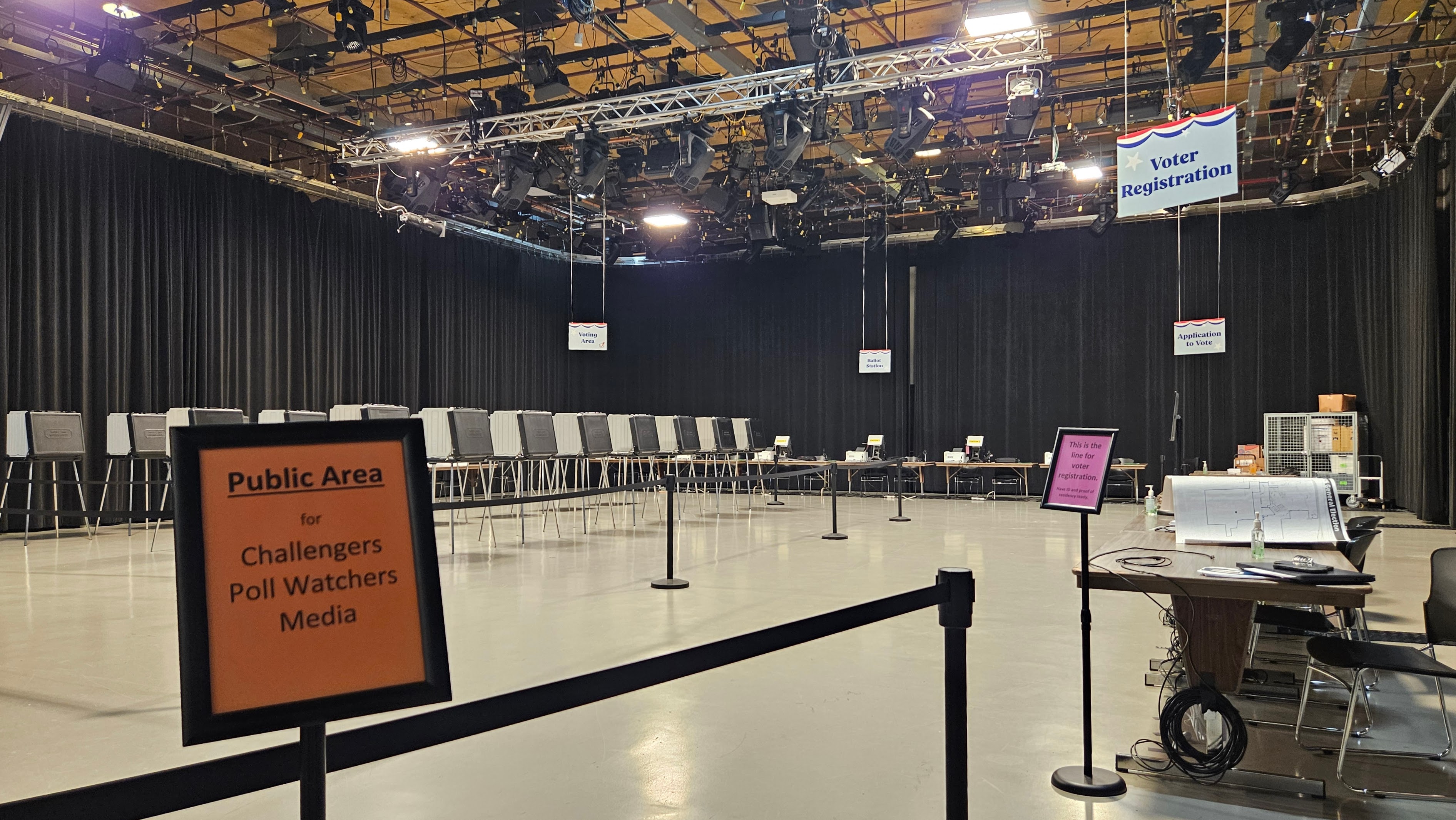 Voting stations and registration tables inside WKAR Studio A before the early voting center opens.