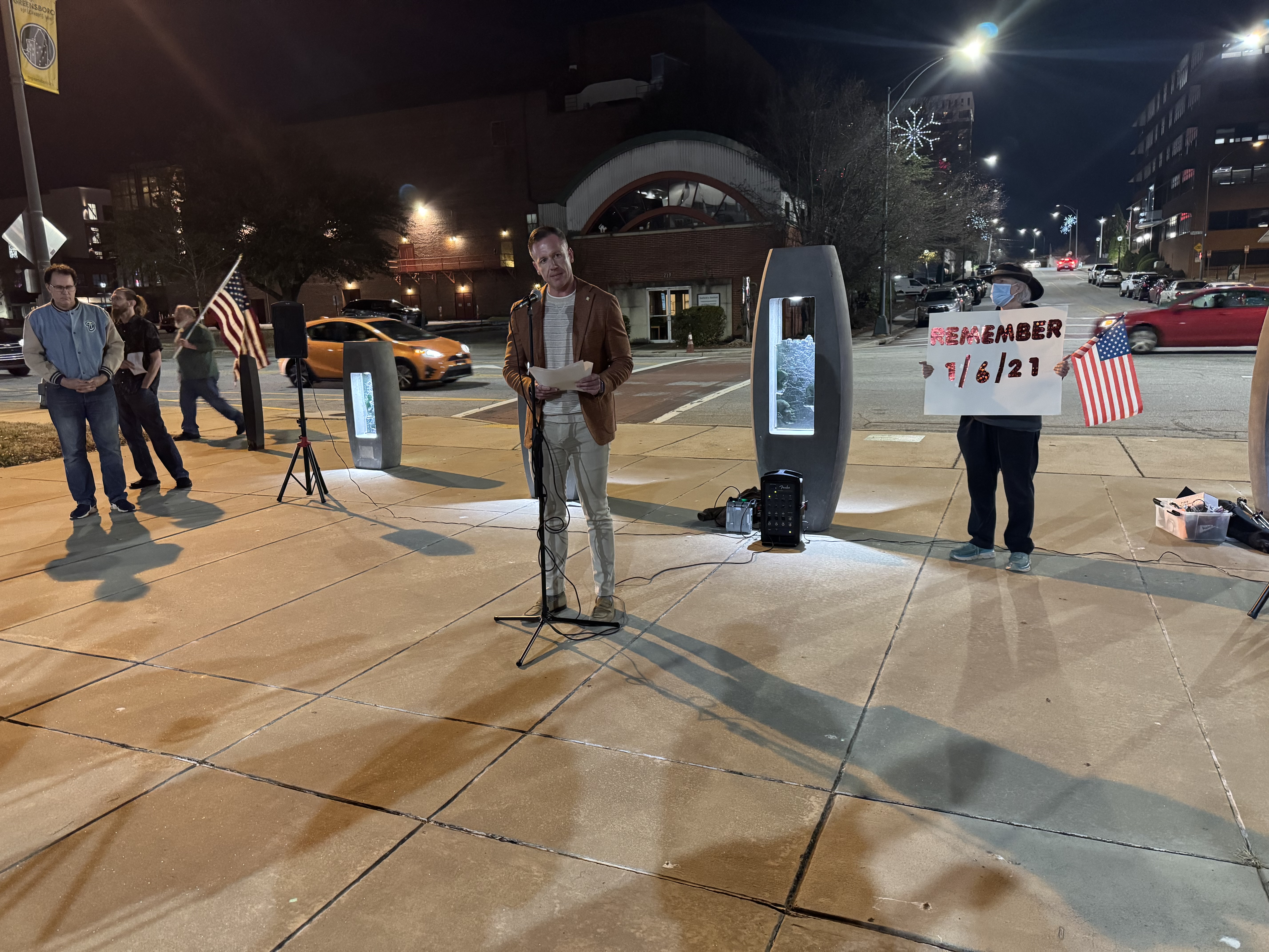 Local group holds candlelight vigil in Greensboro for fifth anniversary of Jan. 6