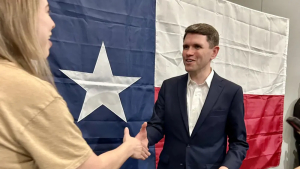 State Rep. James Talarico, a candidate for U.S. Senate, shakes hands with a supporter during a campaign rally in Houston on Sept. 13, 2025.