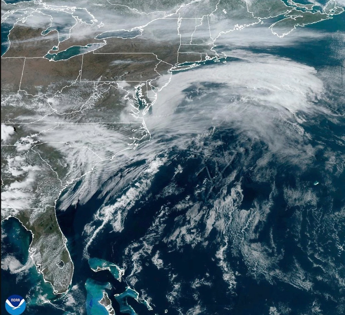 This satellite image from NOAA shows a March megastorm building across the United States on Thursday, March 13, 2025.