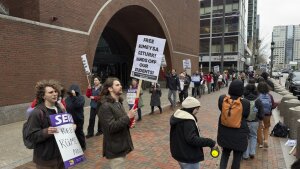 Protesters gather outside federal court during a hearing with lawyers for Rumeysa Ozturk, a Tufts University doctoral student from Turkey who was detained by immigration authorities, in Boston.
