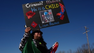 Protesters gather Jan. 28 outside the South Texas Family Residential Center detention facility where Liam Ramos and his father were being detained in Dilley, Texas.