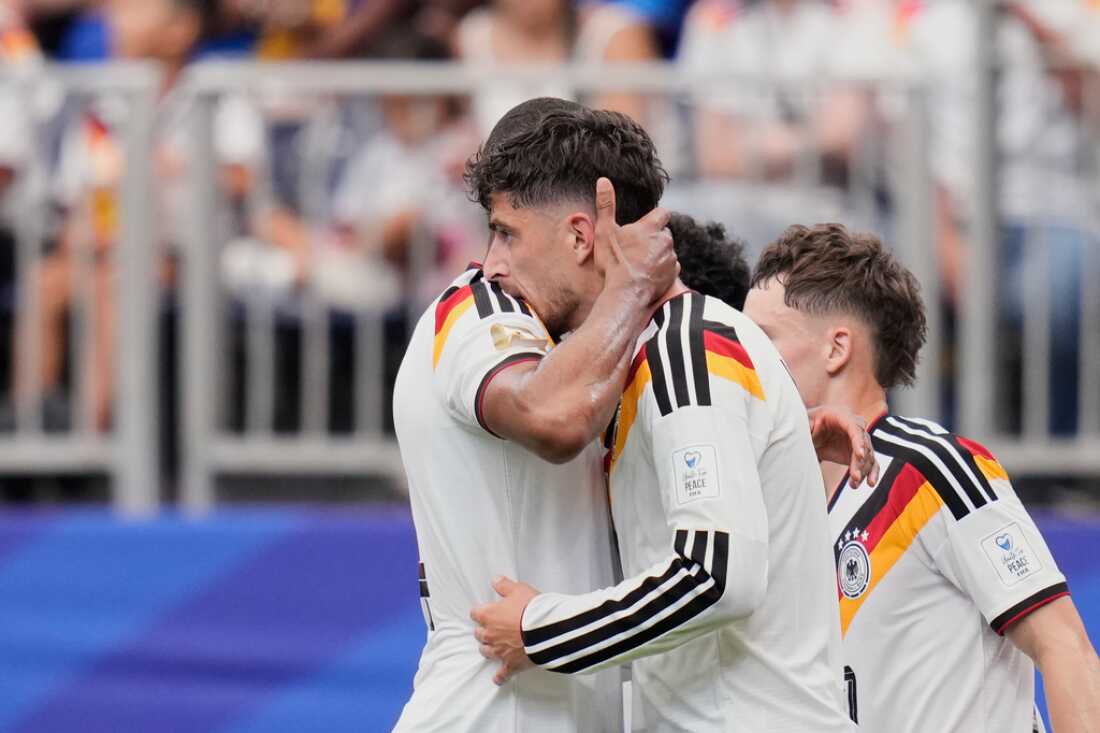 Germany's Kai Havertz celebrates with teammate Jonathan Tah, left, after scoring his side's third goal during the World Cup Group E soccer match between Germany and Curacao in Houston, Sunday, June 14, 2026.