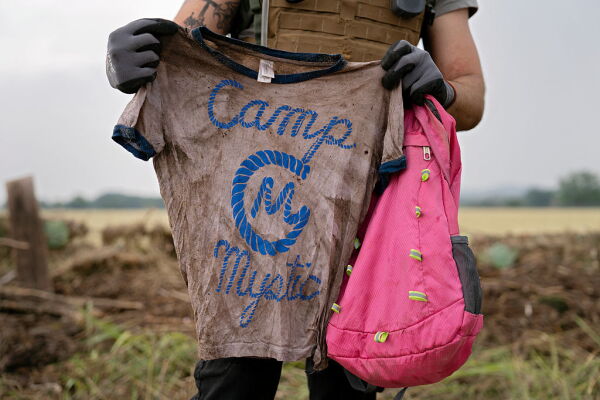 A kid's shirt reading Camp Mystic