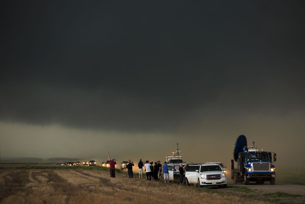 With funding from the National Science Foundation and other government grants, scientists and meteorologists from the Center for Severe Weather Research study a storm in Oklahoma in 2017. They get close to supercell storms and tornadoes to better understand their formation and improve prediction. (Getty Images)