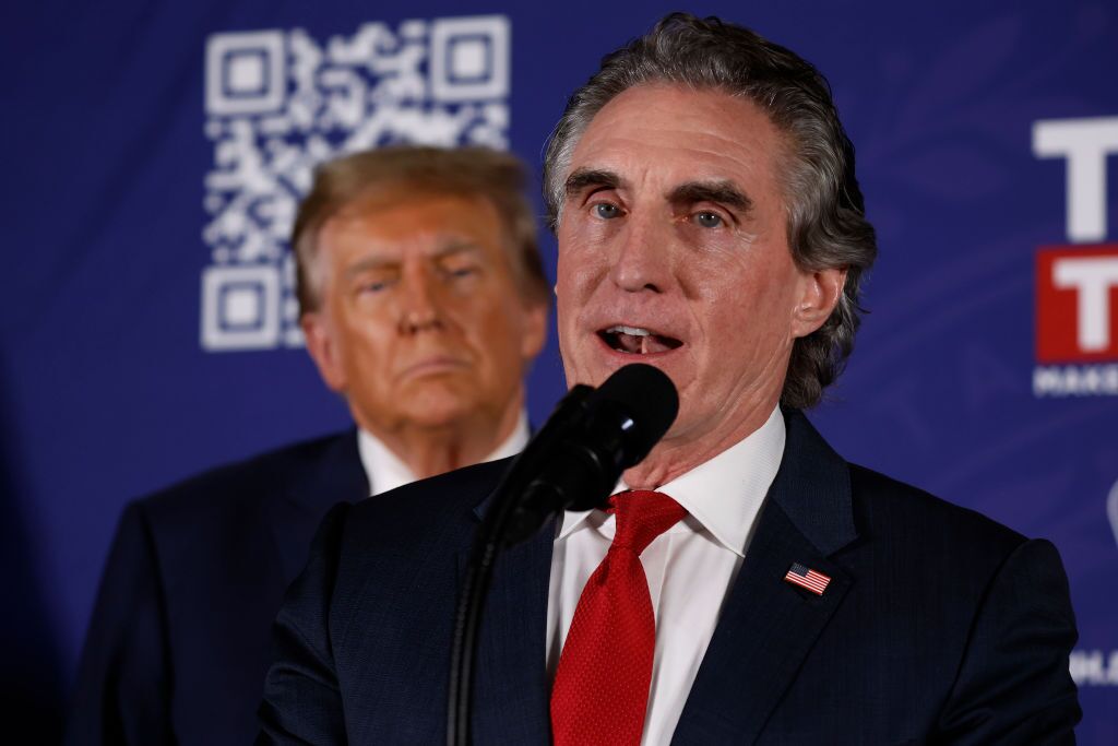Doug Burgum encourages voters to support Donald Trump during a campaign rally in January 2024 in Laconia, N.H. Burgum ran against Trump for the Republican presidential nomination but later dropped out and endorsed him.