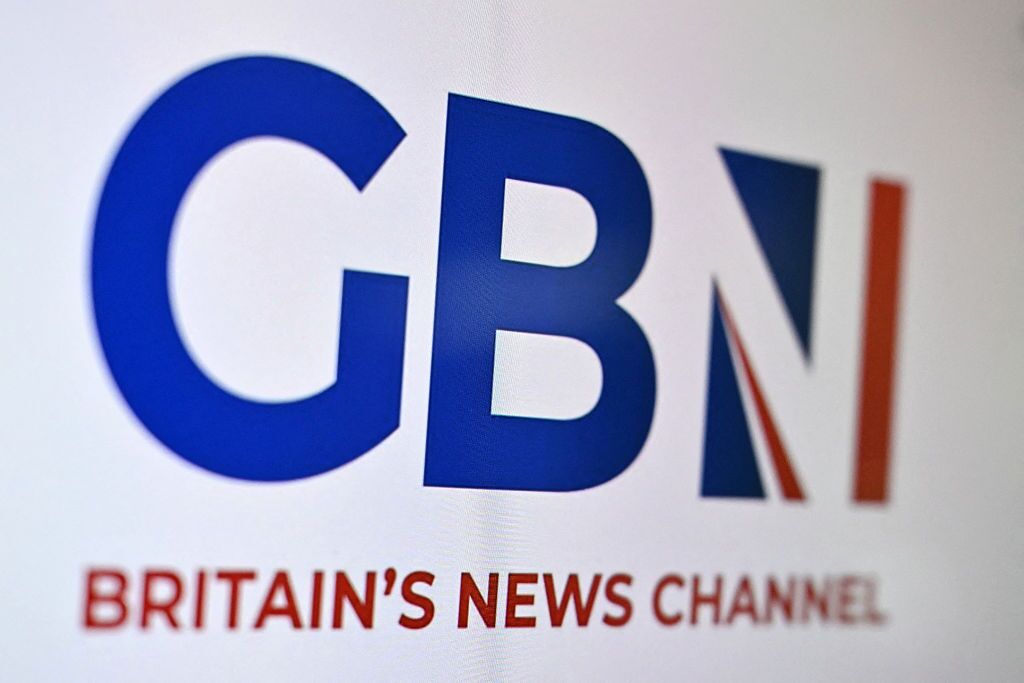 A photograph taken on June 16, 2025 shows the British opinion oriented television and radio news channel GB News logo on their website displayed on the screen of on a computer in London.