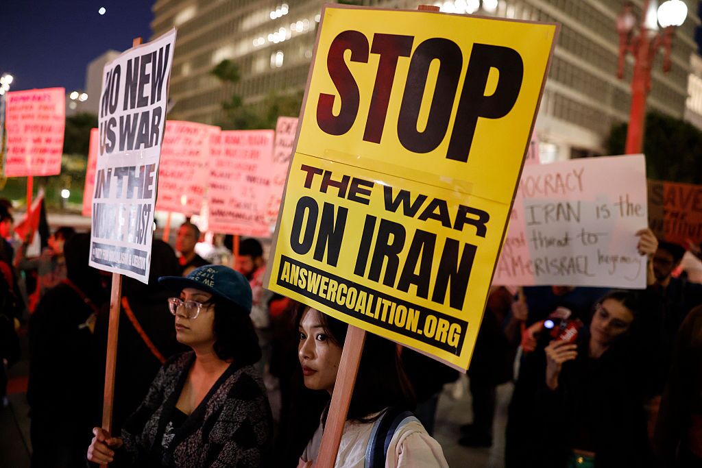 Demonstrators outside City Hall in Los Angeles on March 2 protest against the U.S. and Israel