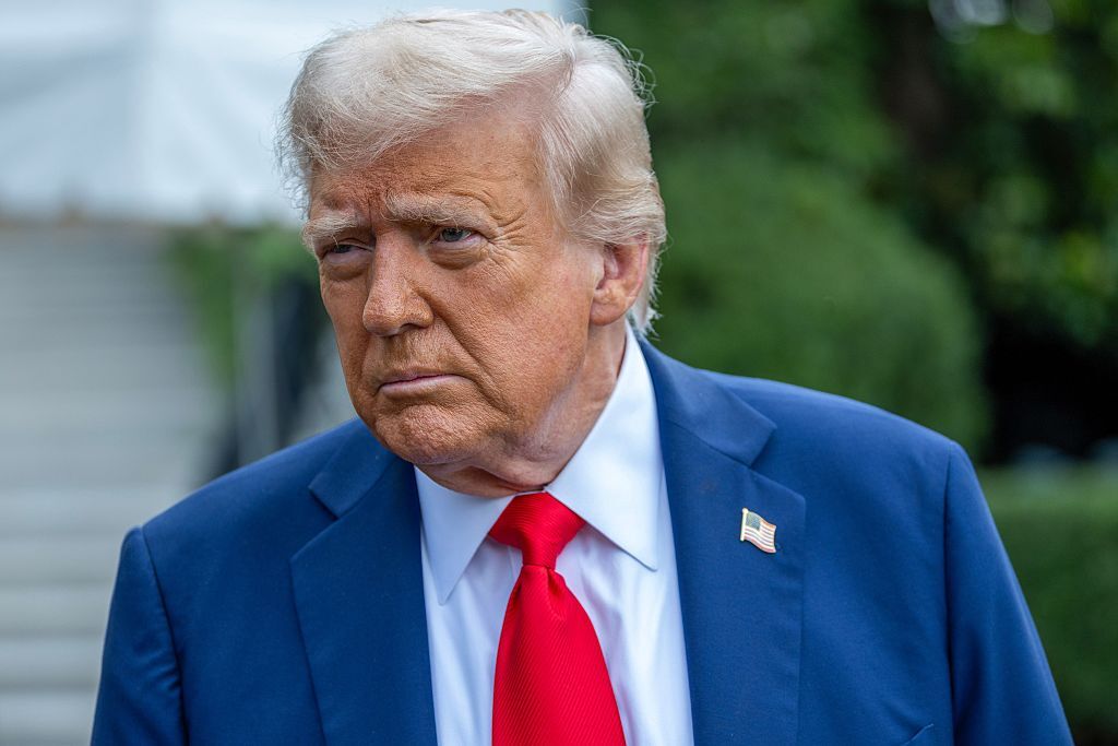 President Trump talks to the media before boarding Marine One on the South Lawn of the White House on Sunday in Washington, D.C.