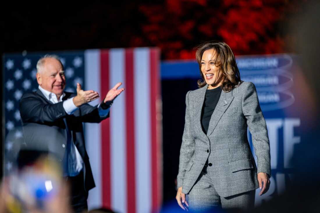 Former Vice President Kamala Harris takes the stage after being introduced by then-Democratic vice presidential nominee, Minnesota Gov. Tim Walz, during a campaign rally on Oct. 28, 2024, in Ann Arbor, Mich.