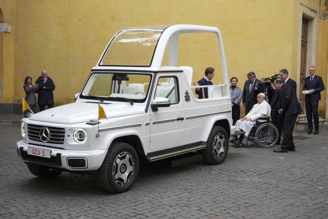 Pope Francis is presented a new fully electric popemobile, at the Vatican, Wednesday, Dec. 4, 2024.