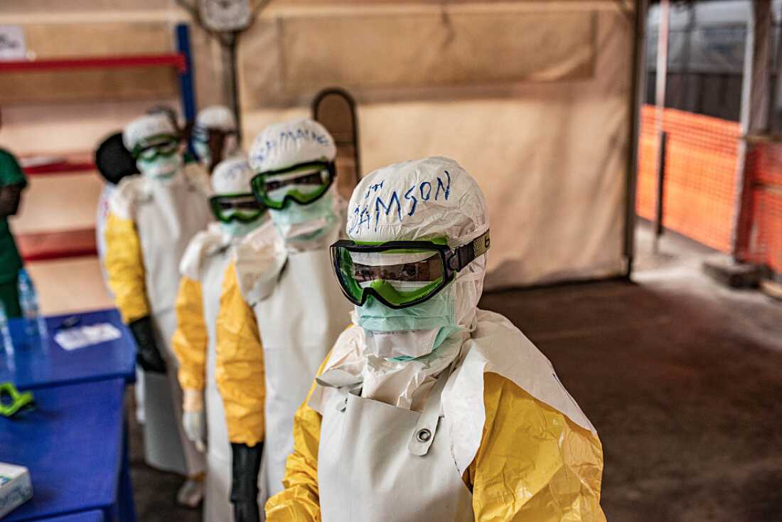 Health workers don protective equipment at an Ebola treatment center on June 2, 2026 in Monigi, Democratic Republic of Congo. The Centre de Traitement Ebola de Monigi (CTE), which is the only such center in Nyiragongo territory, an area of North Kivu north of Goma, has five suspected Ebola cases currently and capacity for 80 patients. As of today, there have been more than 300 confirmed cases of the Bundibugyo strain of Ebola virus in the Congo during the current outbreak, and hundreds more suspected cases, although health officials say the numbers will fluctuate over time as people get tested. The heart of the outbreak is in the Ituri Province, which borders North Kivu Province to the north. (Photo by Daniel Buuma/Getty Images)