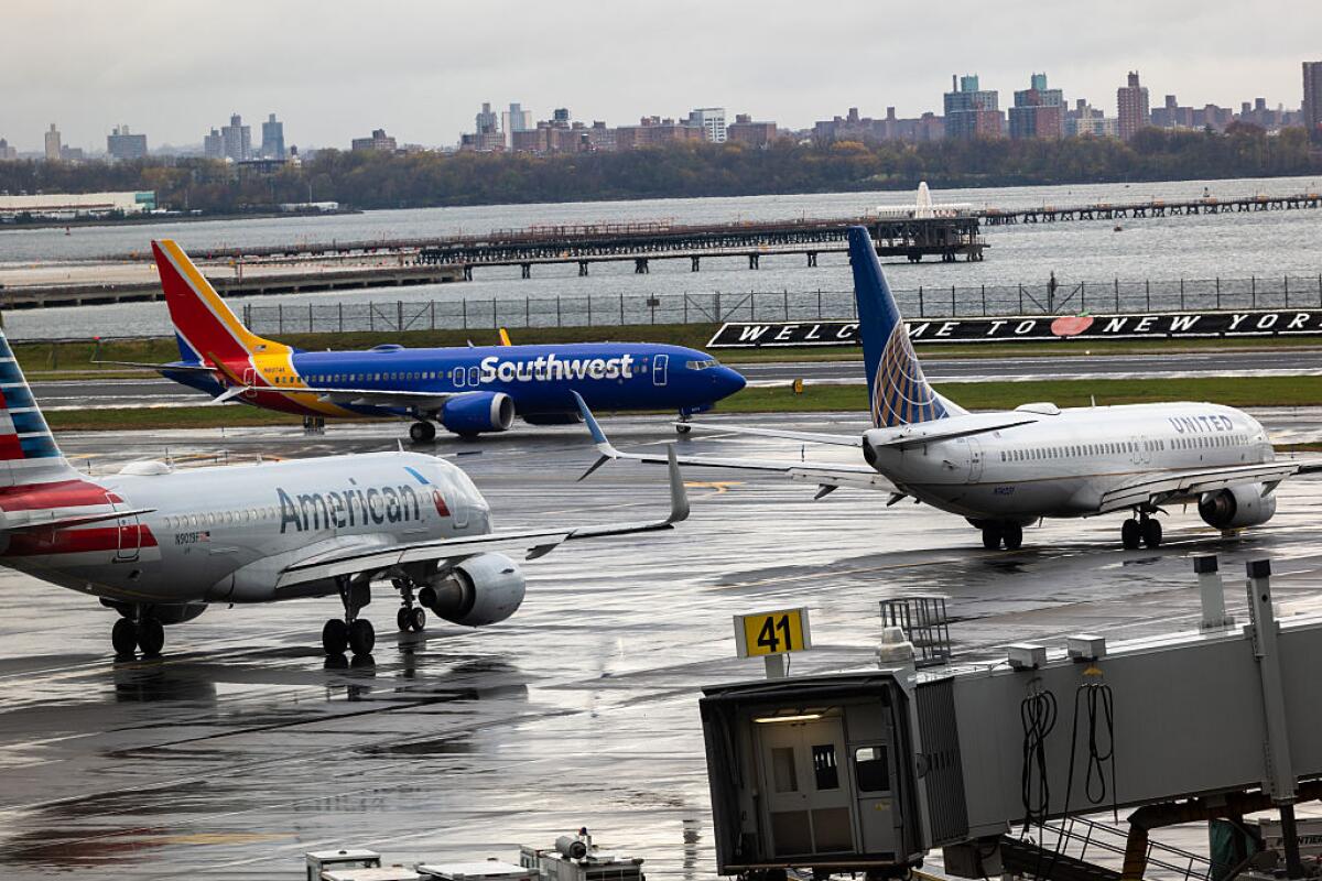 Planes line up on the tarmac at LaGuardia Airport in New York City in November 2025.