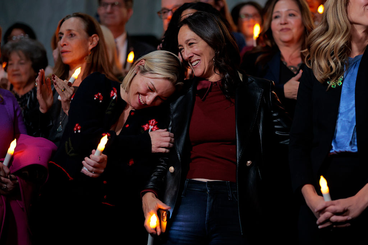 Jeffrey Epstein abuse survivor Danielle Bensky and National Director of World Without Exploitation Lauren Hersh embrace after receiving word that the U.S. Senate unanimously approved passage of the House's Epstein Files Transparency Act on Capitol Hill on Nov. 18, 2025, in Washington, D.C.