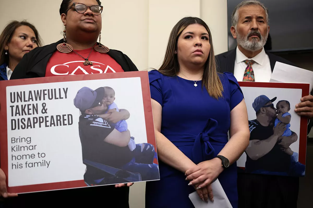 The wife of Kilmar Abrego Garcia, Jennifer Vasquez Sura (center), listens during a news conference to discuss his husband's arrest and deportation on Capitol Hill on April 9.