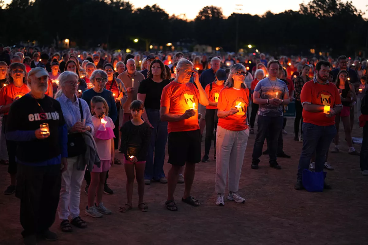 Community members gathered in Minneapolis for a candlelight vigil to honor the victims and survivors of the shooting at Annunciation Catholic School in Minneapolis Wednesday, August 27, 2025.
