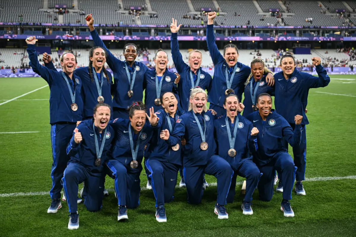 Team USA celebrates with their bronze medals during the victory ceremony during the Paris 2024 Olympic Games at the Stade de France in Saint-Denis on Tuesday.