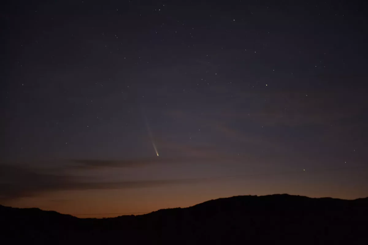 Comet C/2023 A3 Tsuchinshan-Atlas is seen over the hills near the village of Aguas Blancas, Lavalleja Department, Uruguay, at dawn on Sept. 28,.