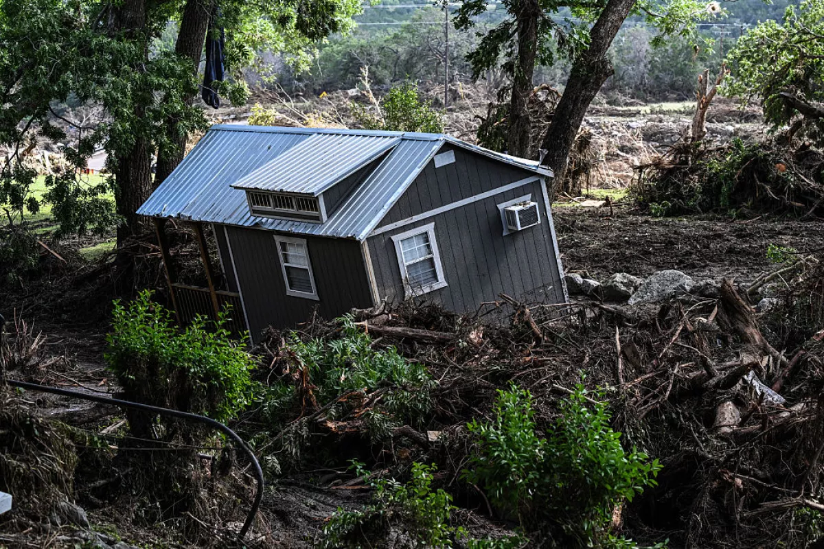 A damaged house near the Guadalupe River in Hunt, Texas, after deadly flash floods hit the area in July 2025. Rural communities rely on federal disaster funds to recover after such weather catastrophes.