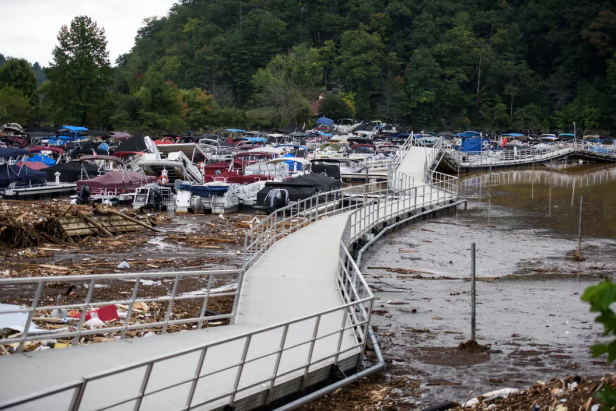 The Rocky Broad River flows into Lake Lure, North Carolina. After heavy rains from Hurricane Helene, the river brought debris from a neighboring community into the town on September 28, 2024. A new study finds that rainfall from Helene was about 10% heavier because of human-caused climate change.