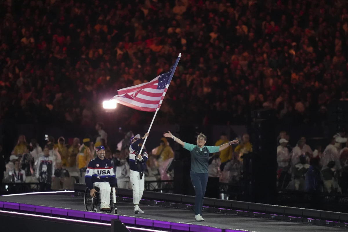 Members of the United States delegation parade Sunday during the closing ceremony of the 2024 Paralympics in Paris