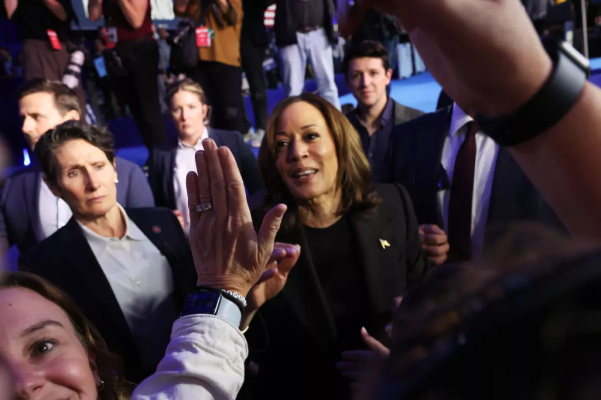 Vice President Harris, the Democratic presidential nominee, campaigns in Waterford, Mich., on Friday. Harris made numerous stops in the state as former President Donald Trump held a rally in Detroit. Early voting begins on Saturday in Michigan.