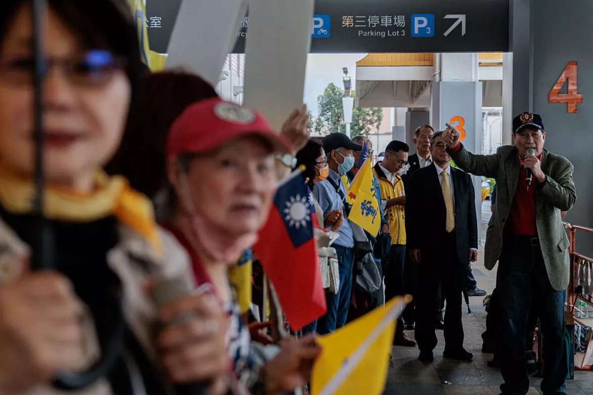 Supporters of Cheng Li-wen, chairwoman of the Kuomintang, gather at Taipei Songshan Airport ahead of her departure for mainland China on April 7, 2026.