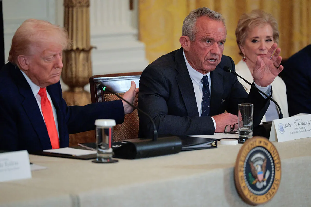 President Donald Trump, Robert F. Kennedy Jr. and Education Secretary Linda McMahon at an event announcing the release of Make America Healthy Again Commission report in the East Room of the White House on May 22, 2025. Also in attendance were several other members of Trump's cabinet who served on the commission including EPA head Lee Zeldin.