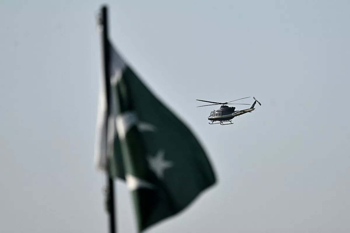 A helicopter flies over the Red Zone area of Islamabad on April 25, 2026.