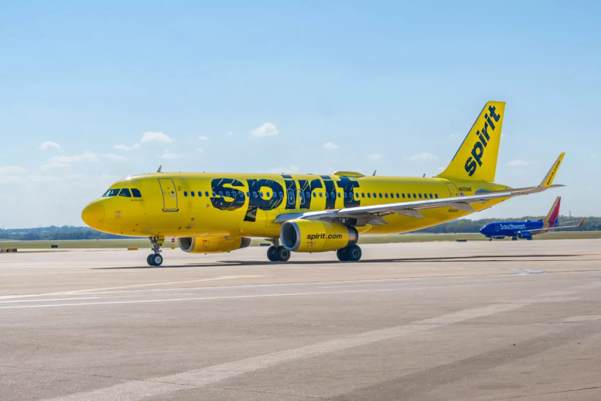 A Spirit Airlines plane prepares to depart from the Austin-Bergstrom International Airport. The low-cost carrier plans to keep flying as it files for Chapter 11 bankruptcy protection.